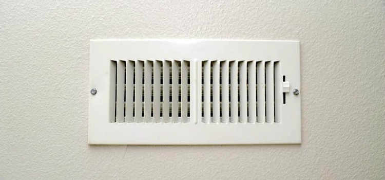 Air vent inside a room on the wall